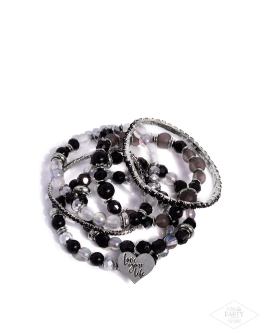 Optimistic Opulence - Black PRESALE