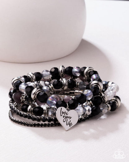 Optimistic Opulence - Black PRESALE