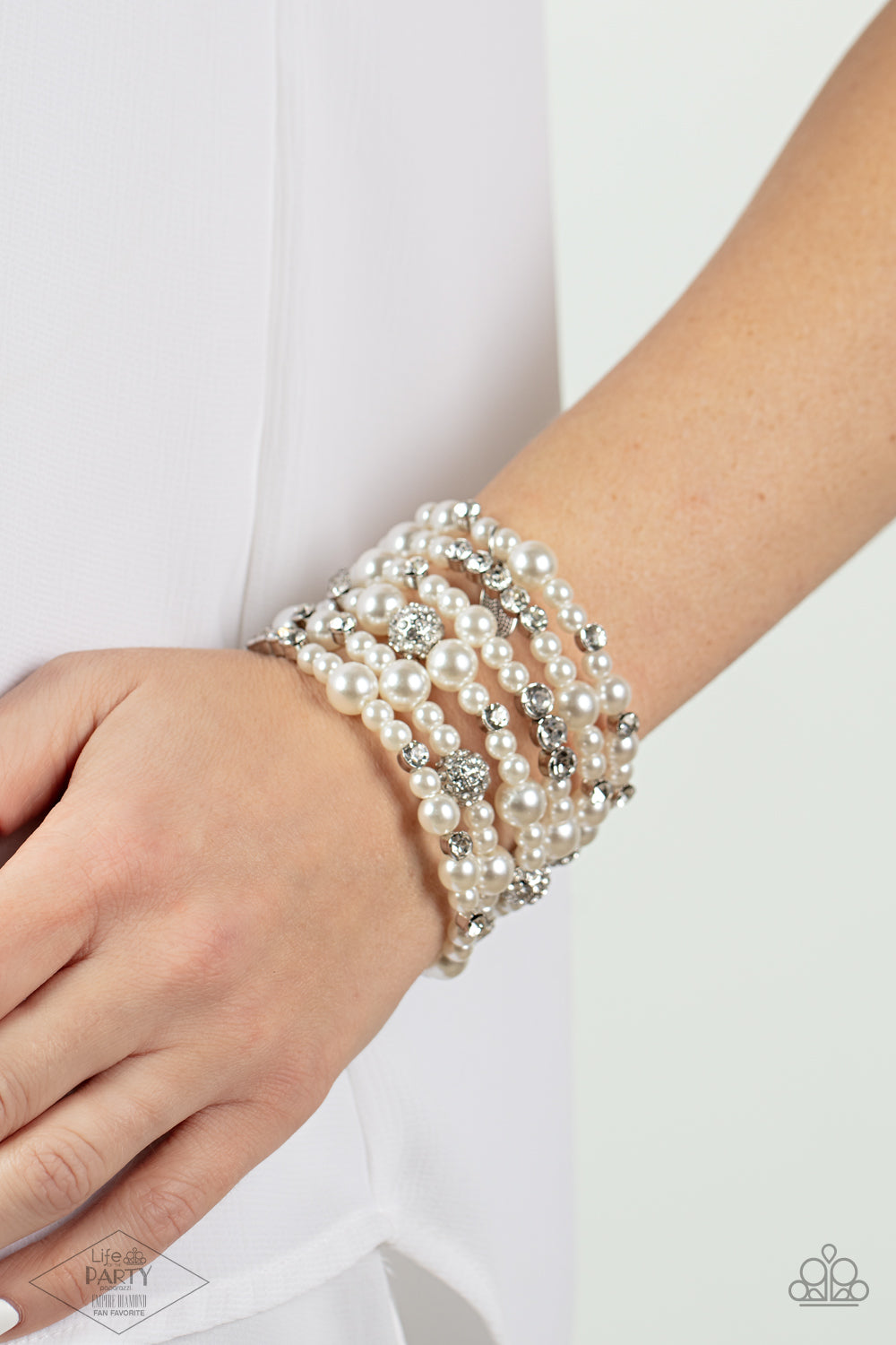 silver, silver jewelry, bracelet, coil bracelet, pearl, pearl jewelry, white, white jewelry, paparazzi accessories, empire diamond exclusive, zi bracelet, affordable jewelry, affordable holiday gift, everyday jewelry, prom jewelry, wedding jewelry, jewelry stores, jewelry stores near me, 